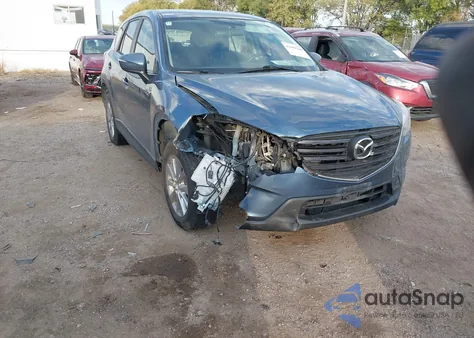 2016 Mazda Cx-5 Sport from USA, damaged, VIN JM3KE4BY4G0660953